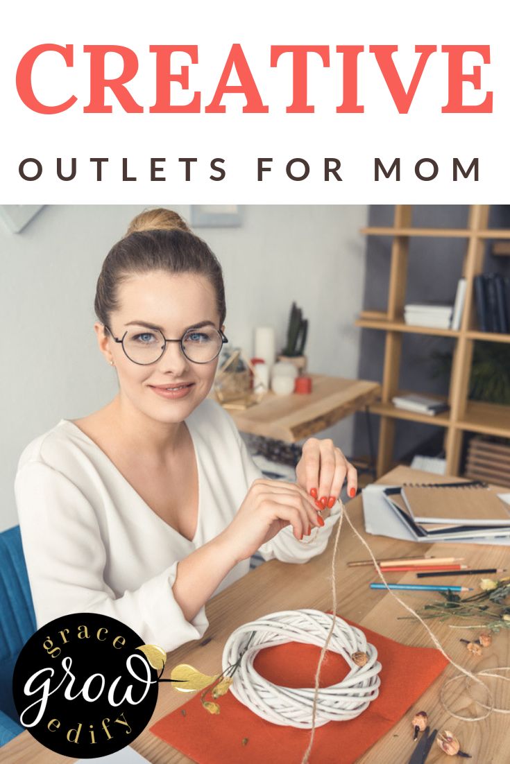 a woman sitting at a table working on something with the words creative outlets for mom