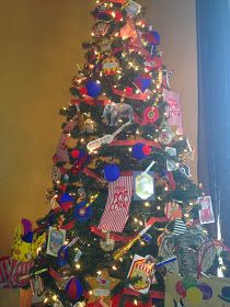 a christmas tree decorated with red, white and blue decorations