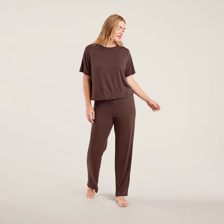 Feel nuud in our cooling pajama top and pant set. Curated with your comfort in mind, this breathable set will move with you throughout the night and on your DND (Do Not Disturb) days. Model Dimensions: Katie is 5?11? and wearing size M.Bust: 37?Waist: 30?Hips: 41? Versatile Seamless Tops For Loungewear, Basic Stretch Cropped T-shirt For Loungewear, Basic Cropped T-shirt For Loungewear, Casual Seamless Tops For Lounging, Seamless Tops With Minimal Stretch For Loungewear, Seamless Top With Minimal Stretch For Loungewear, Ribbed Relaxed Fit T-shirt For Loungewear, Relaxed Fit Ribbed T-shirt For Loungewear, Relaxed Fit Seamless Top For Loungewear