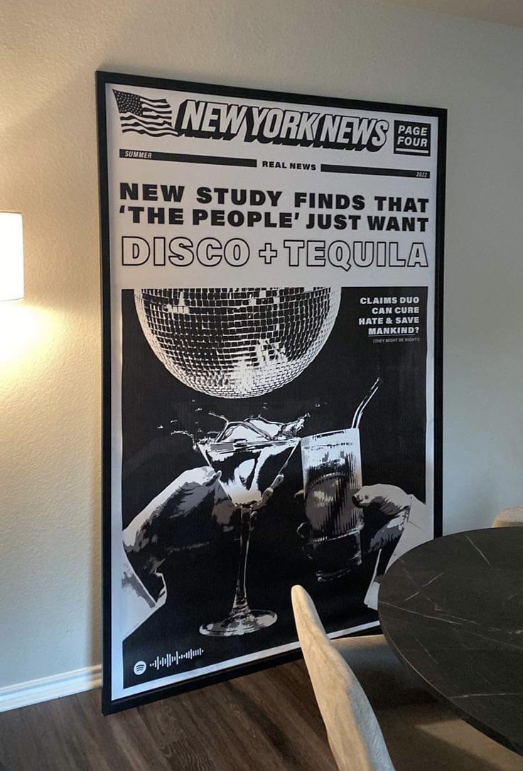 a newspaper is hanging on the wall