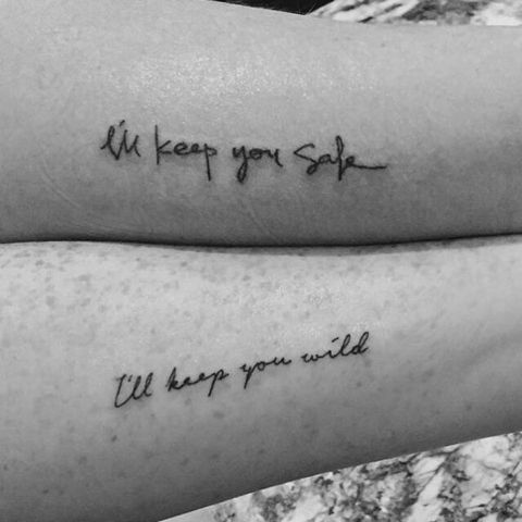 two people with tattoos that say i'll keep you safe