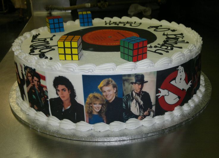 a birthday cake decorated with photos of the characters from tv show saved by its name