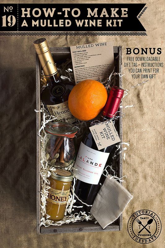 an open wine box containing bottles of wine and some other condiments with the words how to make a mulled wine kit