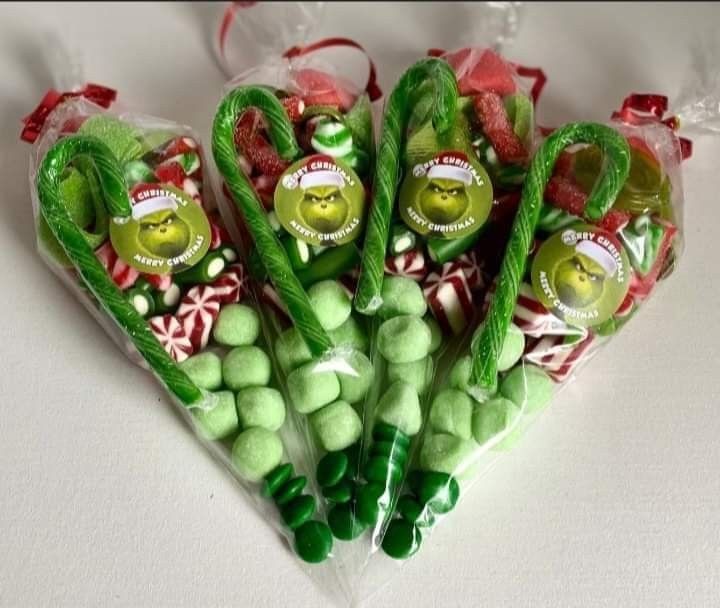 green candy candies in the shape of heart shaped bags