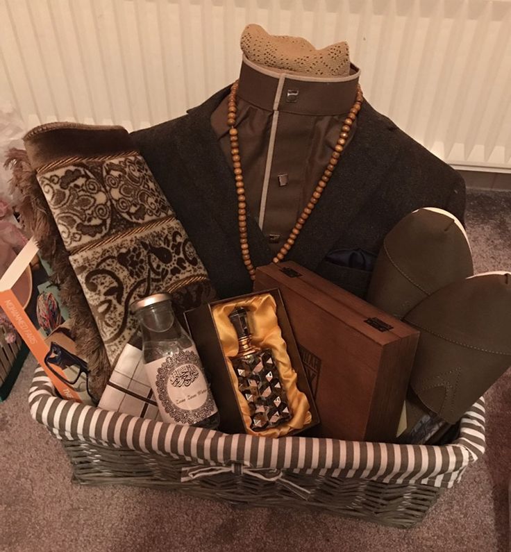 a mannequin is sitting in a basket filled with items