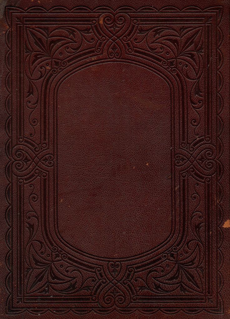 an old book with intricate design on the cover