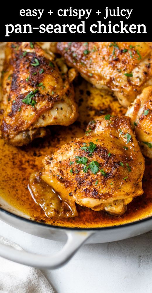 chicken with gravy in a skillet on top of a white countertop