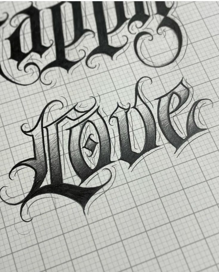 some type of lettering that looks like it has been drawn on paper with graph paper