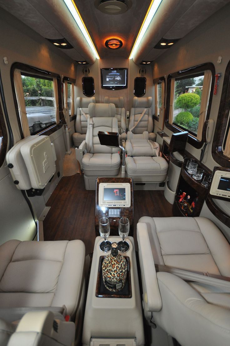 the inside of a bus with many seats