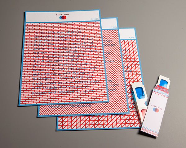 three red and blue patterned papers next to a white envelope