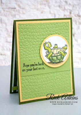 a close up of a card with a turtle on it