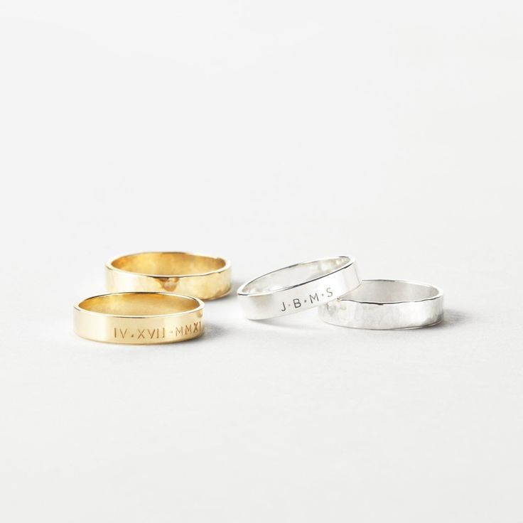 "A classic band ring like no other. Simple, sleek and ready to personalize with an initial, name, mantra or date! Makes a sublime everyday stacking ring or sentimental wedding band. Every piece is handcrafted and hand-personalized with love in La Conner, WA, using 90% recycled and 100% ethically sourced raw materials from the USA--because it's better that way. Includes free gift-ready packaging (featuring a care card and traditional letterpress goodies made by my dad)!  MATERIALS: * Gold = 14k gold filled * Silver = sterling silver DETAILS: * 4mm wide band * Hand-personalized with traditional metal punches * Choose a single initial in our elegant font -OR- multiple characters in our classic font AT CHECKOUT: * If you chose \"other\" for size, specify which ring size you'd like in a note. Modern Stackable Initial Ring For Anniversary, Classic Adjustable Stackable Rings With Initials, Minimalist Stackable Rings With Initials For Anniversary, Minimalist Initial Ring With Engraving Option, Minimalist Engraved Ring With Engraving Option, Minimalist Engraved Ring With Initials For Anniversary, Classic Stackable Initial Ring, Customizable Minimalist 14k Gold Engraved Ring, Minimalist Engraved Ring With Initials