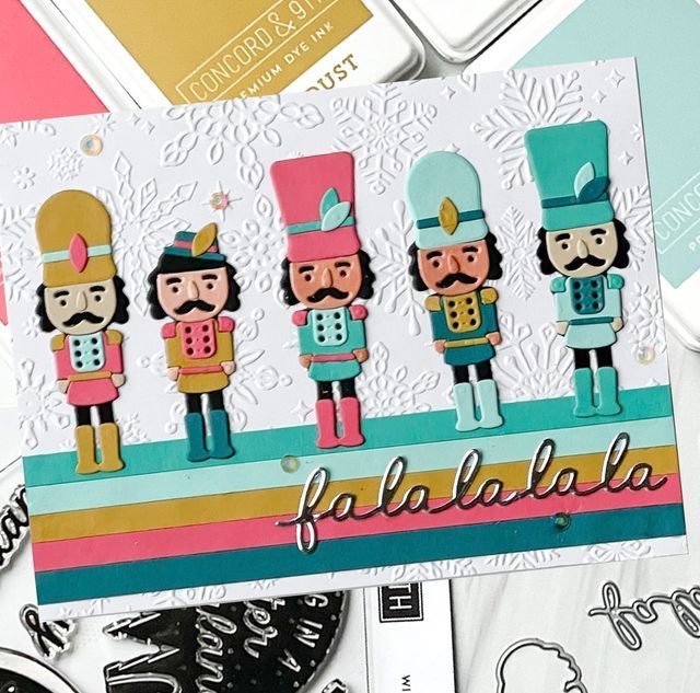 a card with three nutcrackers on it