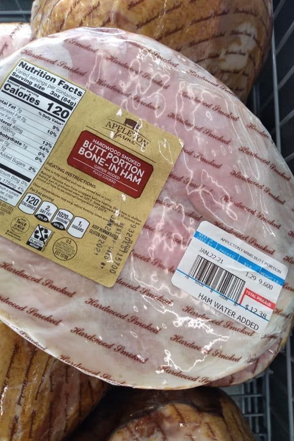 packaged meats are stacked on top of each other