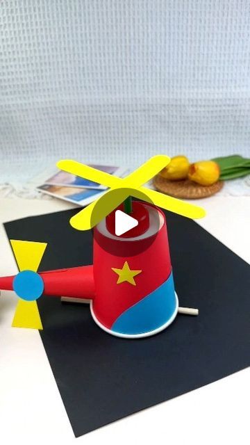 a paper toy that is on top of a table