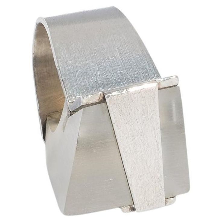 Modernist Geometric Jewelry For Formal Occasions, Modern White Gold Metal Rings, Modern Silver Rings With Unique Design, Modern Silver Wide Band Jewelry, Modern Metal Rings With Unique Design, Modern Silver Jewelry With Wide Band, Modern Metal Rings For Formal Occasions, Contemporary Silver Ring With Unique Design, Modern Jewelry Ring With Unique Design