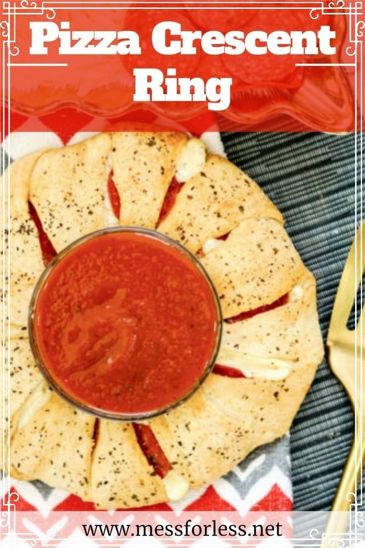 pizza crescent ring with ketchup on top and fork next to it in the middle