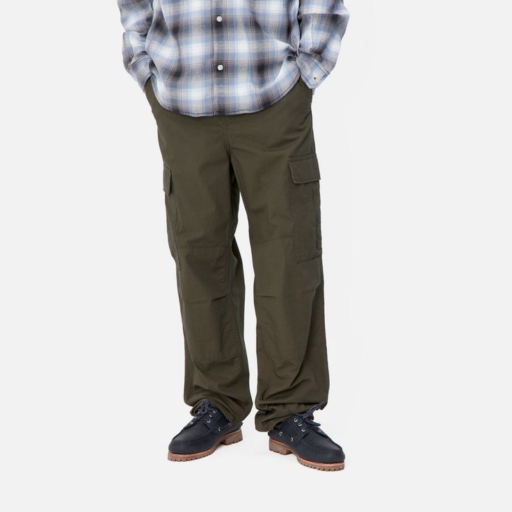 Color: Cypress - The Regular Cargo Pant is made of midweight cotton Columbia ripstop, which has been rinsed for a softer feel. The style is cut in a regular fit with a low waist and features double-layer knees, adding to its robust qualities. Multiple pockets throughout nod to the garment's military-style influences, and tie detailing at the cuffs allow for the fit to be adjusted. The Aviation Pant () offers the same lightweight quality construction with a slimmer fit. _* Columbia ripstop: 100% Outdoor Work Pants In Cargo Style With Relaxed Fit, Outdoor Work Pants With Patch Pockets, Outdoor Cotton Work Pants With Patch Pockets, Relaxed Fit Cargo Work Pants For Outdoor, Cotton Work Pants With Patch Pockets For Outdoor, Cotton Cargo Jeans For Outdoor, Relaxed Fit Cotton Cargo Jeans For Outdoor, Relaxed Fit Cotton Work Pants For Outdoor, Cotton Relaxed Fit Work Pants For Outdoor