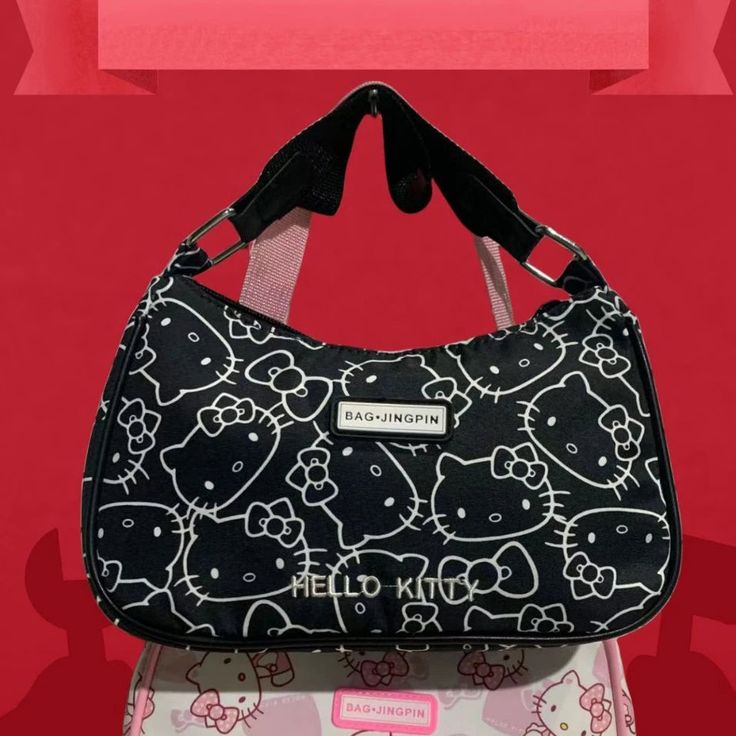 y2k-kawaii-fashion-Sanrio Handbag-Black Hello Kitty-24X17X7cm-Pinky Dollz Retro Black Baguette Bag For Daily Use, Trendy Black Shoulder Bag With Cat Design, Trendy Bags With Cat Design, Black Cat Design Shoulder Bag For School, Trendy Rectangular Bag With Hello Kitty Print, Trendy Hello Kitty Print Rectangular Shoulder Bag, Casual Rectangular Bags With Hello Kitty Print, Casual Rectangular Bag With Hello Kitty Print, Black Shoulder Bag With Cat Design For Daily Use