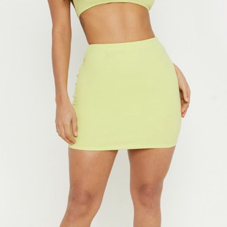 Never Worn !!! Lime Green, Jersey Material . Trendy High Waist Yellow Skirt, Trendy High-waist Yellow Skirt, Chic Yellow Mini Skort, Yellow High-waist Skirt For Summer, Yellow Stretch Mini Skirt, Stretch Yellow Mini Skirt, Green Mini Skirt For Day Out, Yellow Mini Skort For Day Out, Chic Yellow Mini Skirt For Day Out