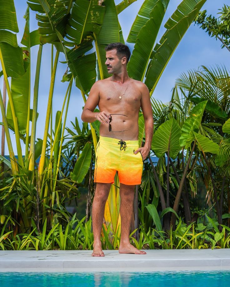 *NEW tapered leg for a more refined fitSay farewell to restrictive swimwear and welcome the freedom you deserve! Radiating a vibrant yellow fading into a striking neon orange, the Faded Waves Sunset 5” swim trunks redefine comfort, guaranteeing unrestrained movement for every beachside escapade. Dive, jump, or simply lounge carefree as these swim shorts become your indispensable summer companion. Recognising the value of time, especially during vacations, our swim shorts boast an exceptional qui Value Of Time, Waves Sunset, Trunks Swimwear, Mens Swim Shorts, Perfect Marriage, Mens Swim Trunks, Designer Swimwear, Man Swimming, Neon Orange