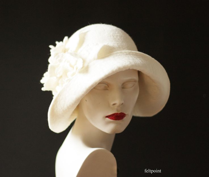 Mrs Fisher style hat hand made, entirely from the highest quality merino wool. Beautiful white/ivory color of the hat.   The hat is soft, very pleasant to the touch, nicely placed on the head.  Special and unique ! Sophisticated and elegant ! I can make this hat in other colors and sizes.  In the last photo I show the colors of merino wool, from which I make hats. You can choose the color that suits you and send it to me in the e-mail after purchase. Made just for you  All my works are made by h White Felt Hat With Short Brim, Winter Cream Fitted Fedora, White Fitted Felt Hat With Curved Brim, Elegant White Brimmed Felt Hat, Fitted White Hat With Curved Brim, White Fitted Hat With Curved Brim, Classic White Felt Hat With Short Brim, Fitted White Felt Hat With Wide Brim, White Spring Felt Hat With Short Brim