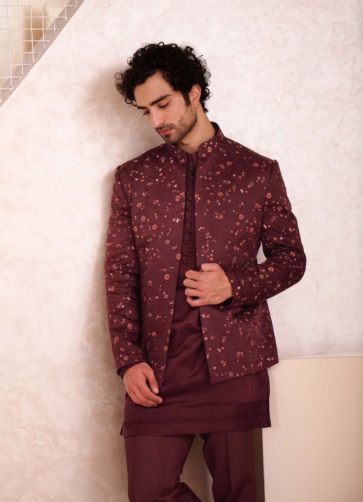 Editor's Note Showcasing The Infamous Kashmiri Jamawar Hand Embroidery On Our New Wine Short Jacket Set. Paired Tone-on-tone Short Kurta And Tapered Trousers. Fabric: Linen Silk Color: Wine Component: Jacket, Kurta, Trousers Care: Dry Clean Only About the Designer After establishing himself as the leading couturier in the industry of menswear, Jatin Malik went on to explore luxury footwear. You can order online these amazingly designed handmade shoes that are being offered in classy Caligae and Festive Nehru Jacket With Floral Embroidery And Stand Collar, Formal Floral Embroidery Nehru Jacket For Festivals, Formal Floral Embroidered Nehru Jacket For Festivals, Red Festive Semi-formal Blazer, Fitted Zari Work Set With Stand Collar, Festive Nehru Jacket With Intricate Embroidery For Winter, Fitted Nehru Jacket With Floral Embroidery, Fitted Nehru Jacket With Floral Embroidery And Stand Collar, Fitted Long Sleeve Bandhgala For Festivals