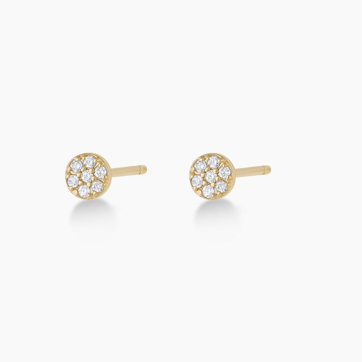 A vintage-inspired setting is an ideal way to highlight the natural brilliance of the diamonds on these studs. A stunning statement on its own or an equal match for the other earrings in your stack. Make it a single Product Details 0.07 total carat weight Fourteen 1 mm round GH SI1-SI3 diamonds 14k solid gold 4 mm diameter Post back | Diamond Pavé Studs Earring , Women's in 14k gold by Gorjana Earrings Stacking, Black Labradorite, Orange Agate, Yellow Opal, Iridescent Crystal, Solid Gold Chains, Diamond Pendants, Disc Earrings, 14k Gold Necklace