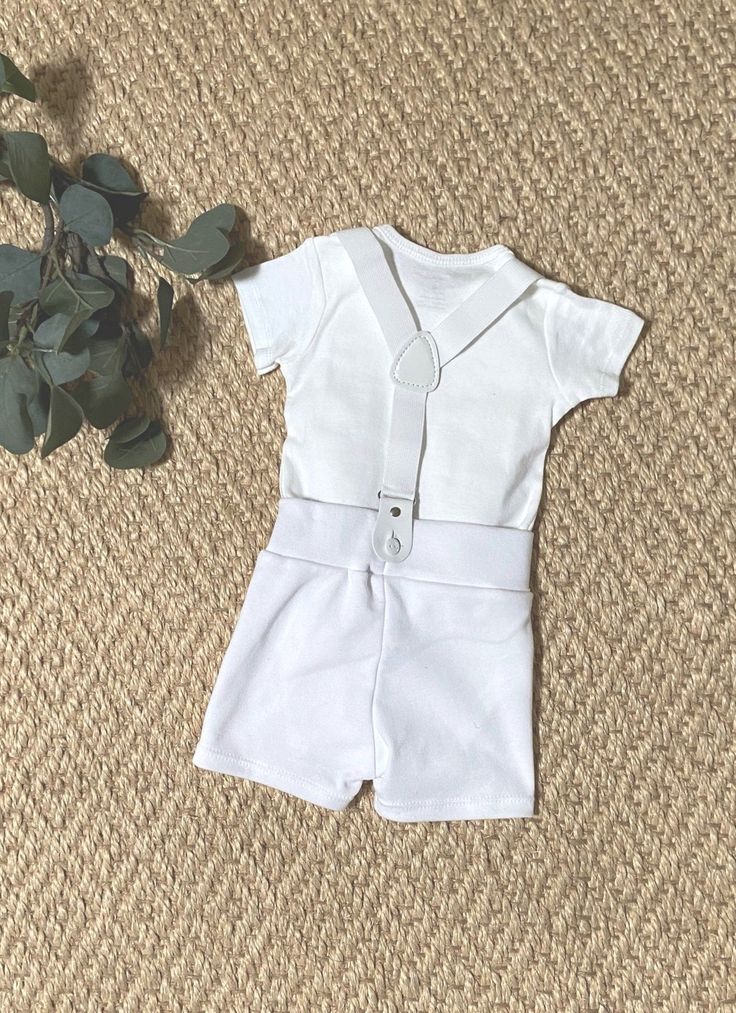 "This is the short sleeve with short pants version of the Boys Tuxedo for Baptisms, Christenings, Blessings and Weddings. If you need long sleeves please look at long sleeve listing at https://www.etsy.com/listing/579449576/baby-boy-baptism-christening-blessing?ref=shop_home_feat_2&frs=1 Beautiful, custom made outfit that is suitable for baptism, christening, blessings, weddings or any special event. A formal look with lots of comfort for your little man! Made using Carter's white bodysuits White Tux, Boys Tuxedo, Baby Boy Baptism, White Bow Tie, Outfit Short, Baby Boy Clothing Sets, Boy Baptism, Tuxedo Wedding, Formal Look