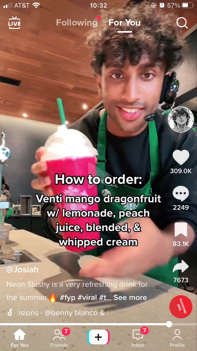 a man holding a drink in front of his face with the caption how to order?