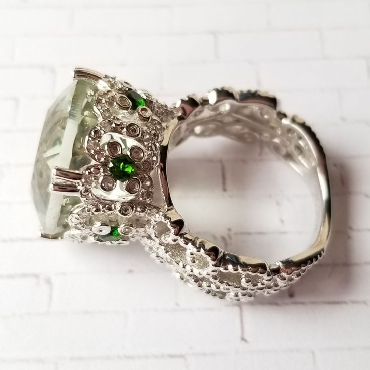 Genuine Prasiolite (Aka Green Amethyst) Genuine Russian Chrome Diopside Genuine White Zircon Incredible, Highly Ornate Setting Fit For A Queen High And Strong Profile Sterling Silver, Stamped 925 Nwot, Never Worn Exceptional Craftsmanship Thick Band Gorgeous Ring Featuring High Quality Gemstones. The Prasiolite Stone In This Ring Has Excellent Clarity And Color. The Faceting Is Also Outstanding. Size 7 Luxury Silver Ring With Gemstone Accents, Luxury Silver Rings With Gemstone Accents, Elegant Green Amethyst Ring In Sterling Silver, Luxury Silver Emerald Ring Gift, Luxury Silver Emerald Promise Ring, Luxury Green Crystal Ring With Gemstone, Luxury Silver Emerald Ring With Gemstone Accents, Exquisite Silver Emerald Ring With Accent Stones, Luxury Green Emerald Ring With Stone Setting