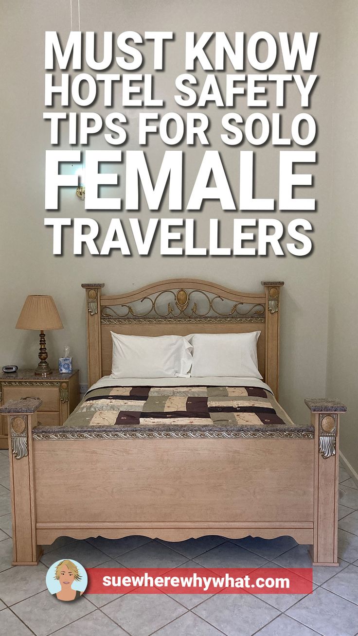 there is a bed with white sheets and pillows in the room that says must know hotel safety tips for solo female travelers