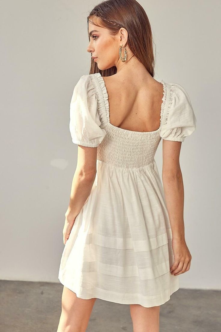 Final Sale - Get it before it's gone! You'll look as sweet as can be in the Josephine White Ruched Puff Sleeve Mini Dress! Woven fabric shapes this dress that has puff sleeve with ruffle trim, a sweetheart neckline, and a ruched bodice. A fitted waist tops an A-line mini skirt with tiers of ribbons. Smocked back for a perfect fit! Lined. DETAILS & CARE 65% Cotton/ 35% Polyester. Rayon lining. Machine wash cold. Imported. Puff Sleeve Ruffle Dress For Day Out, Cute Puff Sleeve Dress With Ruffles And Square Neck, Cute Square Neck Dress With Gathered Sleeves, Cute Puff Sleeve Dress With Ruffles For Garden Party, Cotton Mini Puff Sleeve Dress With Ruffles, Mini Cotton Puff Sleeve Dress With Ruffles, Cute Mini Puff Sleeve Dress With Gathered Sleeves, Cute Puff Sleeve Dress With Square Neck, Knee-length Ruffled Puff Sleeve Dress For Day Out