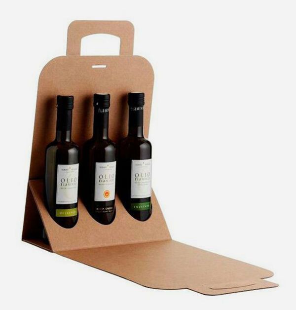 three bottles of wine in a cardboard box