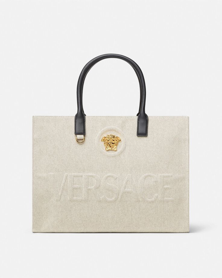 La Medusa Canvas Large Tote Bag Beige | Versace US Luxury Beige Shoulder Bag With Logo Hardware, Beige Leather Bags With Logo Hardware, Beige Shoulder Bag With Embroidered Logo And Double Handle, Beige Top Handle Bag With Embroidered Logo, Double Handle Shoulder Bag With Engraved Logo, Beige Double Handle Bag With Logo Hardware, Beige Double Handle Bags With Logo Hardware, Beige Tote Bag With Logo Hardware, Double Handle Monogram Canvas Bag With Logo