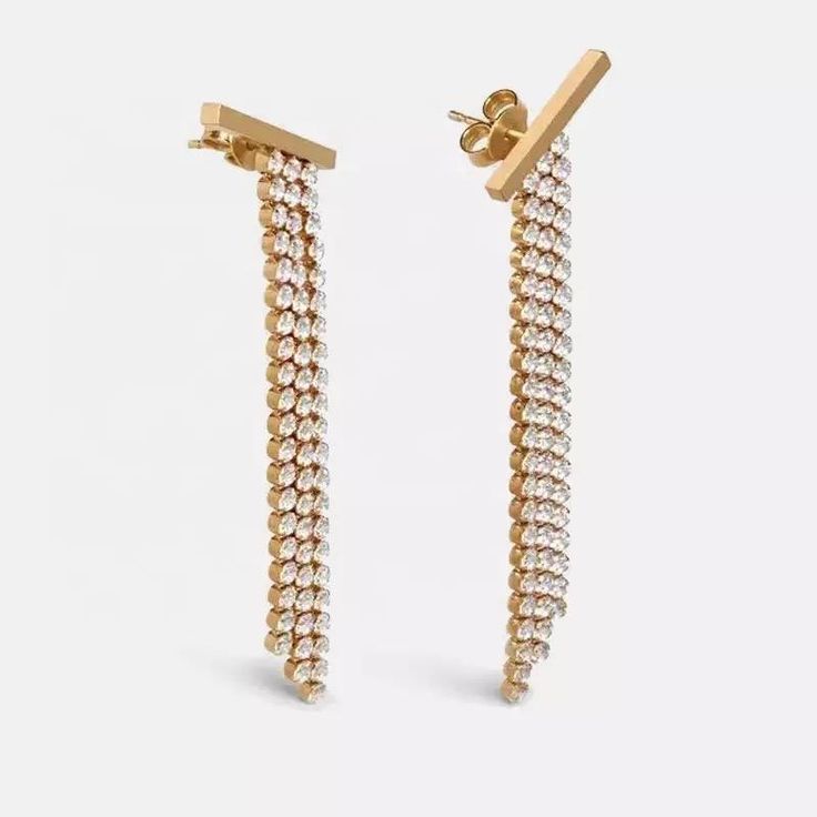 Dazzle them all in the Brooke Dangle Earrings. Wear these gems on a night out to instantly elevate your look and really make an impression. 18k Gold Plated over Stainless Steel 9cm Drop CZ Stones Hypoallergenic Water & Tarnish Resistant Elevate Your Look, Cz Stone, Bobby Pins, Cubic Zirconia, Night Out, 18k Gold, Dangle Earrings, Gold Plate, Hair Accessories