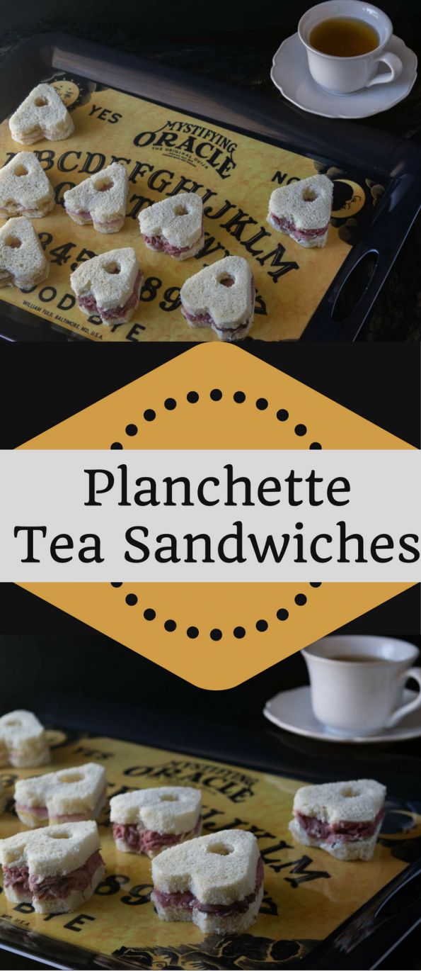 there is a tray with small sandwiches on it and the words planchete tea sandwiches