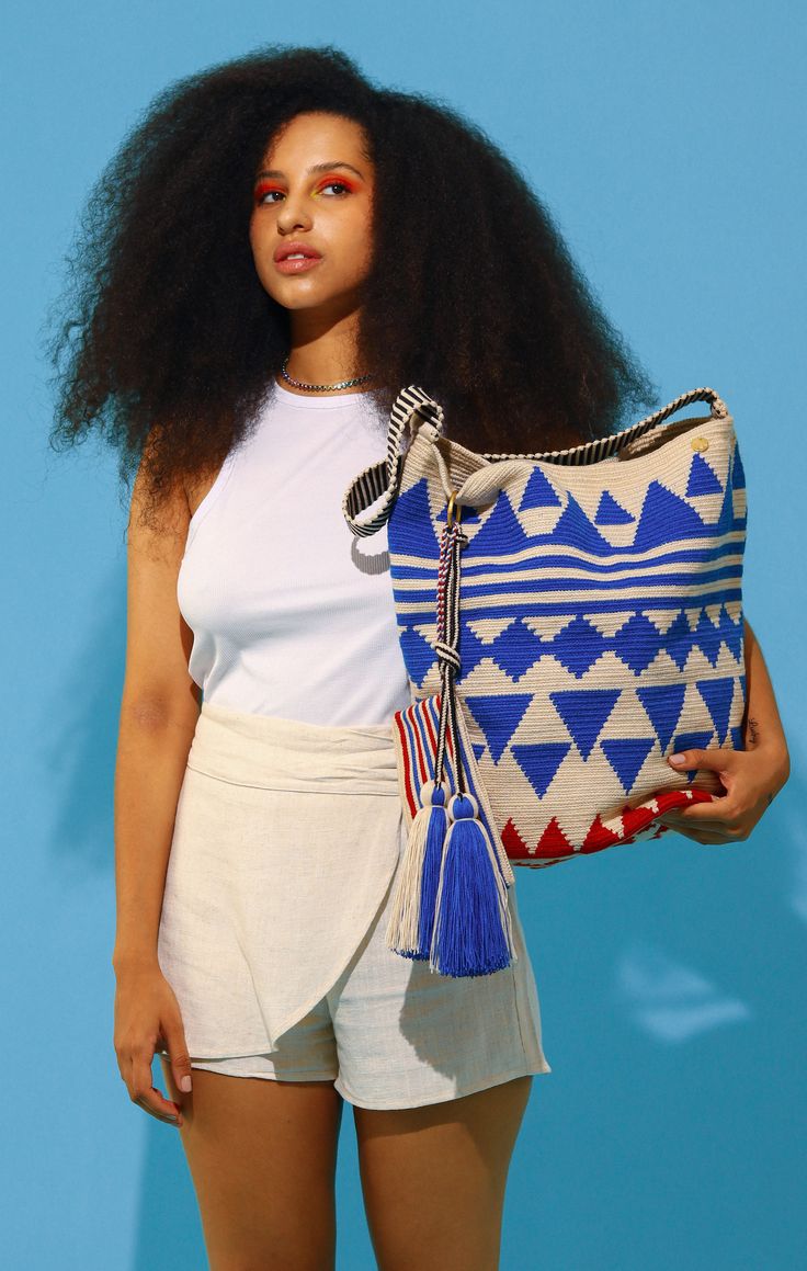 Available for on-demand shopping: order now, save 25% OFF, and we'll craft it fresh just for you, shipping in 21 days! Introducing the Camelia Beach Bag, lovingly handmade by Wayuu Women Artisans. This stylish bag in bright blue and cream is perfect for your summer adventures. It's spacious enough to hold all your beach essentials like towels and sunscreen. Each bag is unique in its desing and details. Elevate your summer style with the Camelia Beach Bag and add a splash of color to your beach d Chila Bags, Wayuu Bag, Beach Essentials, Summer Adventures, Beach Look, Women Artisans, Beach Days, Stylish Bag, 21 Days