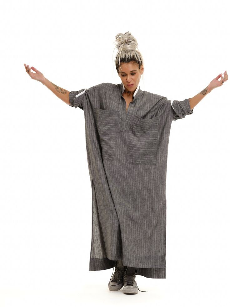 Equal parts comfy and cool, our maxi shirt is the one-and-done deal you need in your wardrobe for days when you can't be bothered to dress up. FEATURES:An oversized button-down striped shirt with side slits and pockets.100% Handmade. SIZE & FIT: Fit: A relaxed fit with room to moveModel is wearing size Small or S/M View our SIZE CHART before ordering MATERIALS & CARE: Content: Linen Care: Dry cleaning only SHIPPING: Made to order, processing time is 15 working days This item will be shipped via DHL Maxi Shirts, Striped Shirt, Dress Shop, Unique Designs, Dress Up, Relaxed Fit, Wardrobe, How To Wear, Dresses