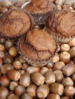 several muffins sitting on top of each other next to some nutmeal