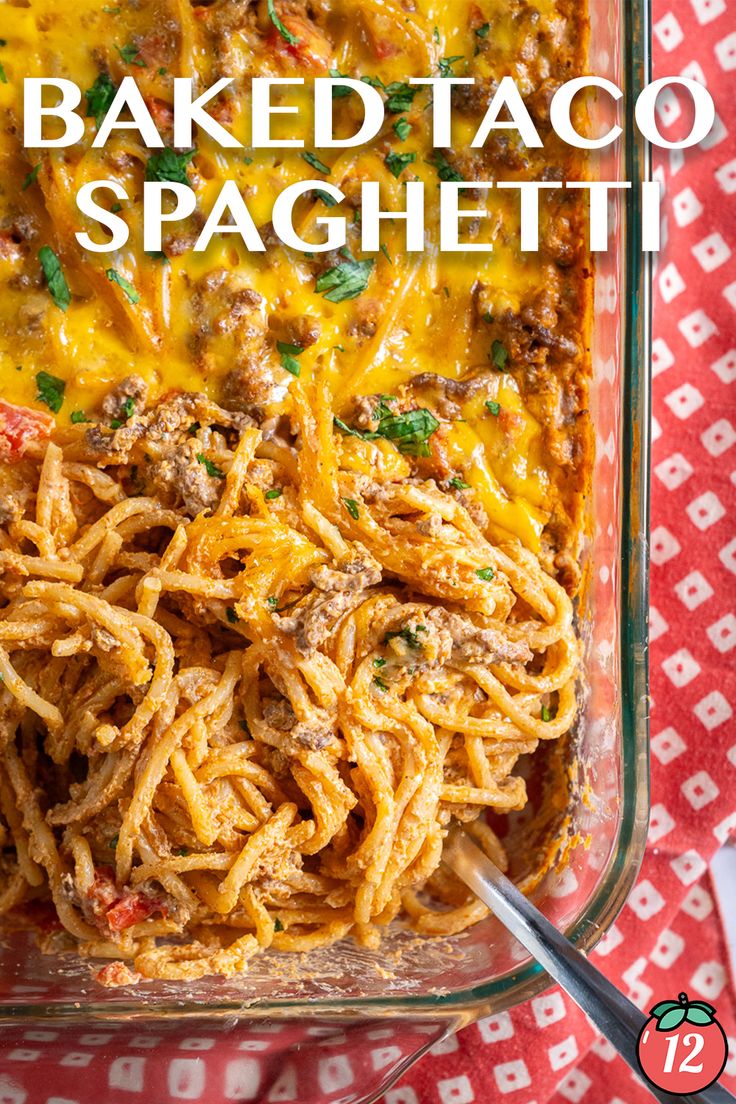 baked taco spaghetti in a glass casserole dish