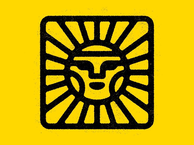 a black and yellow lion head in the center of a sunbursted square