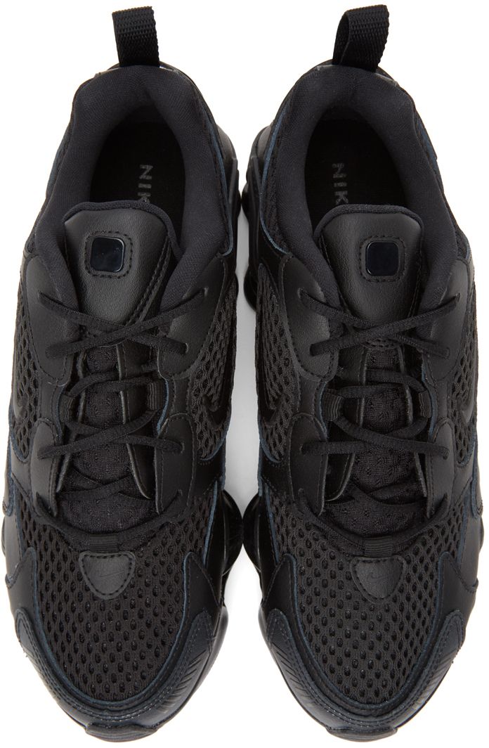 Low-top panelled mesh and grained faux-leather sneakers in black. Reflective trim at round toe. Tonal signature Swoosh printed at vamp. Lace-up closure. Rubberized logo at padded tongue. Padded collar. Embroidered signature Swoosh at sides. Webbing pull-loop at heel tab. Textile trim in black and white featuring signature Swoosh at heel counter. Tonal foam rubber midsole featuring signature Shox unit. Tonal treaded rubber outsole.Supplier color: Black/Black Nike For Women, Nike Clothing, Nike Outfits, Nike Black, Luxury Streetwear, Leather Sneakers, Air Jordan Sneaker, Black Nikes, Baby Shoes