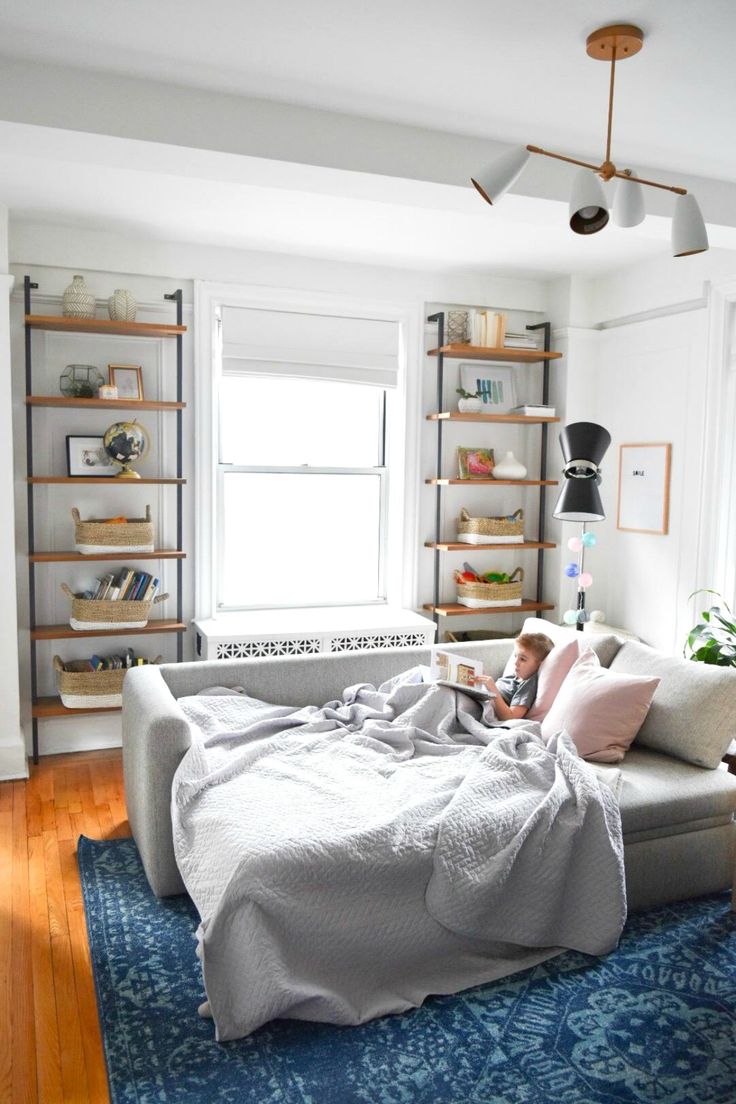 the instagram page shows an image of a woman sitting on a couch in her living room