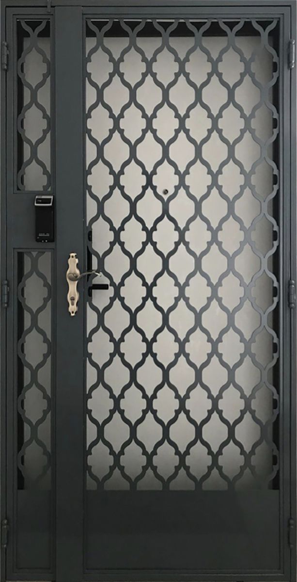 an ornate iron door with glass panels on the front and side doors, which are black