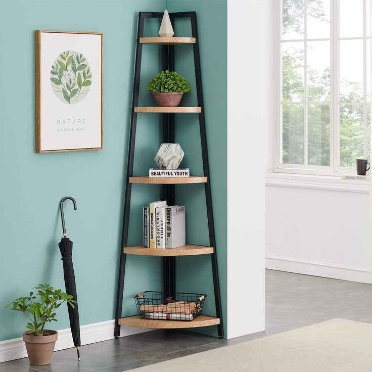 a corner shelf with an umbrella and potted plants on it in front of a blue wall