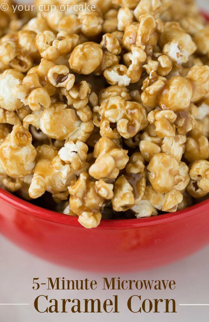 a red bowl filled with caramel popcorn on top of a white tablecloth and text overlay reads, 5 - minute microwave caramel corn