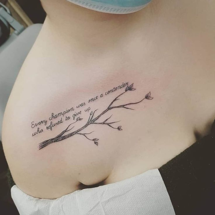 a woman's chest with a quote on it