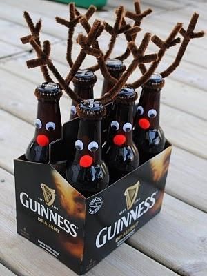 some beer bottles with reindeer antlers in them