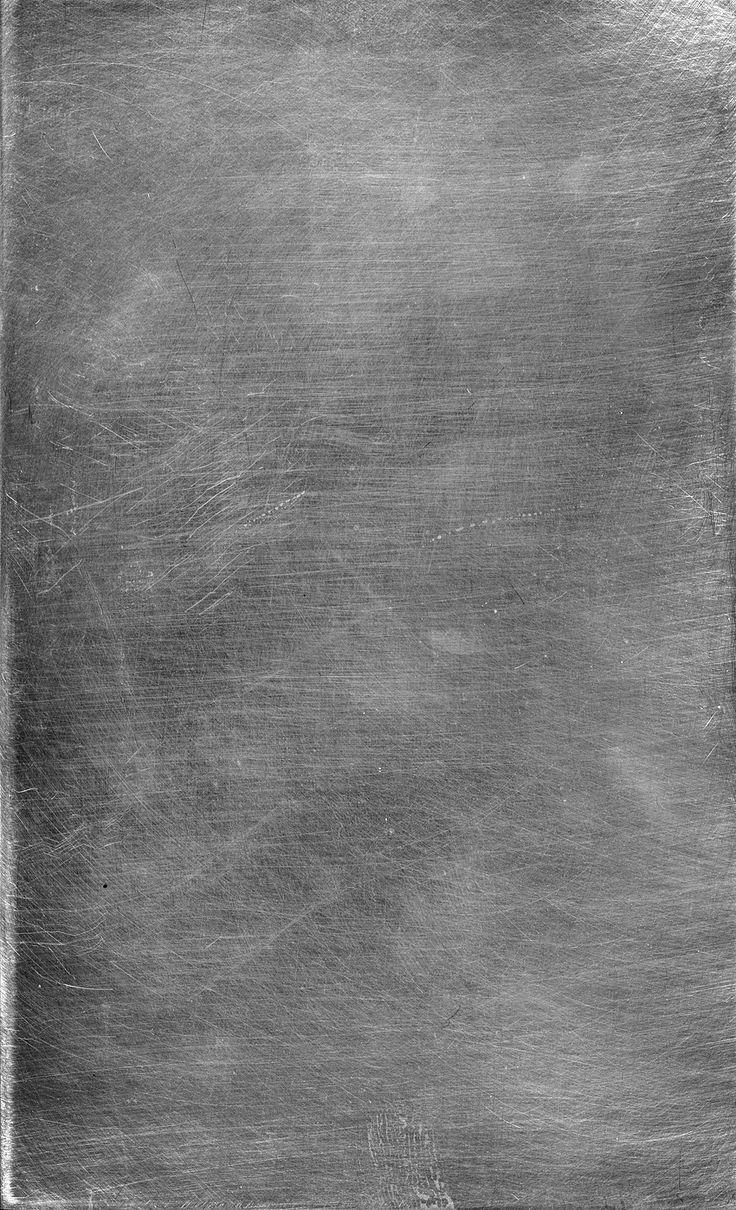 black and white photograph of an empty metal plate